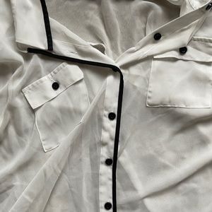 Sheer white with black trim blouse